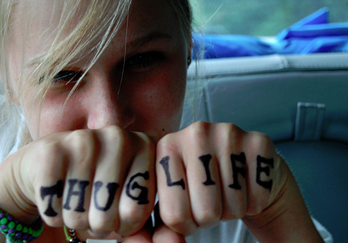 Thug Life Knuckle Tattoo On Girl Fingers