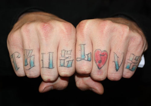 Thug Love Music Tattoo On Fingers