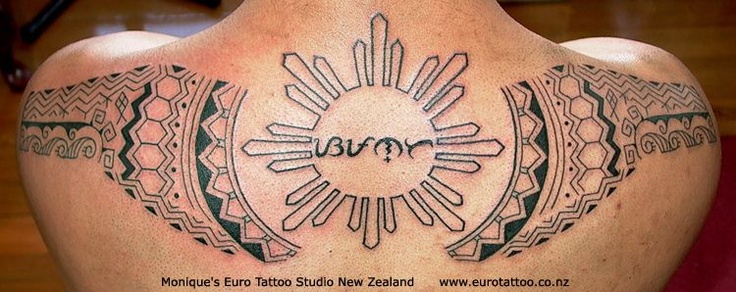 Tribal Sun And Alibata Tattoo On Upper Back For Men