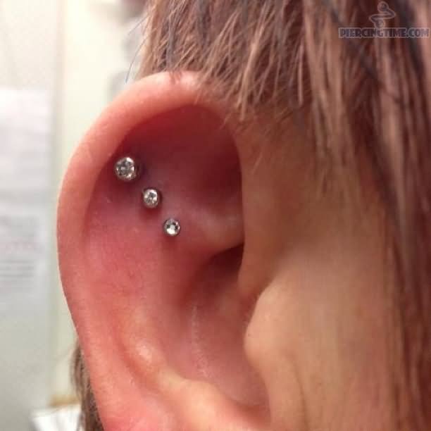 Triple Outer Conch Piercing On Right Ear
