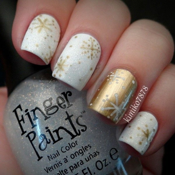 White Nails With Gold Snowflakes Design Nail Art