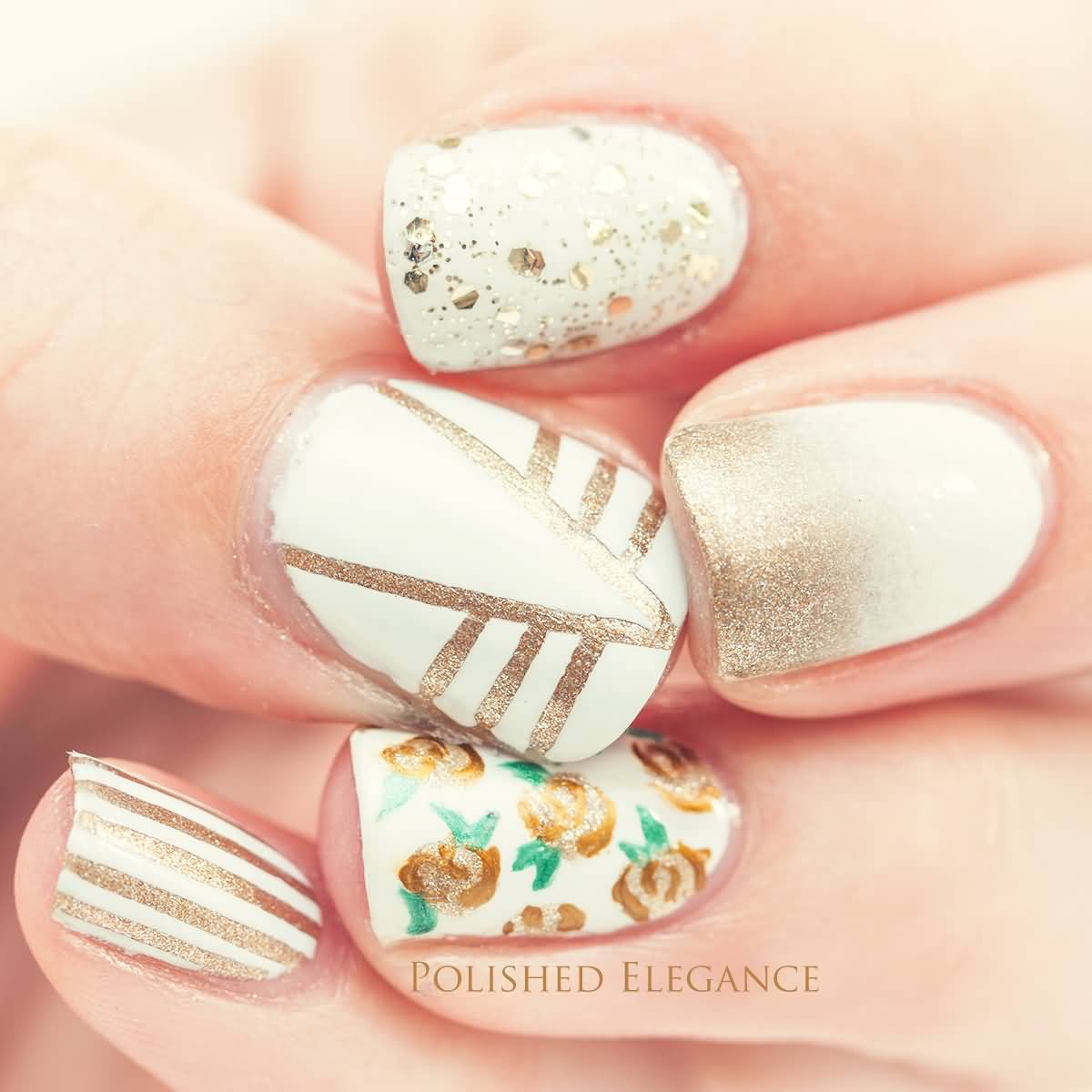 White Nails With Gold Stripes And Sparkle Nail Art