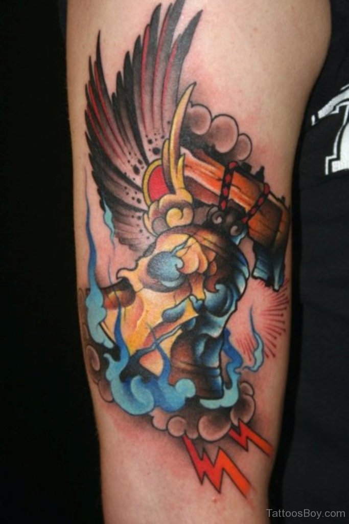 Winged Bell And Blue Flame Tattoo On Arm Sleeve