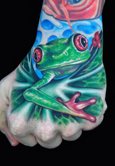 Wonderful Frog On Leaf Tattoo On Hand