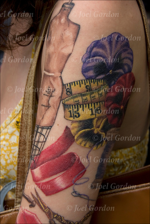 Wonderful Sewing Color Tattoo On Left Arm Sleeve