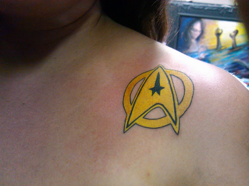 Yellow Ink Star Trek Tattoo For Girls