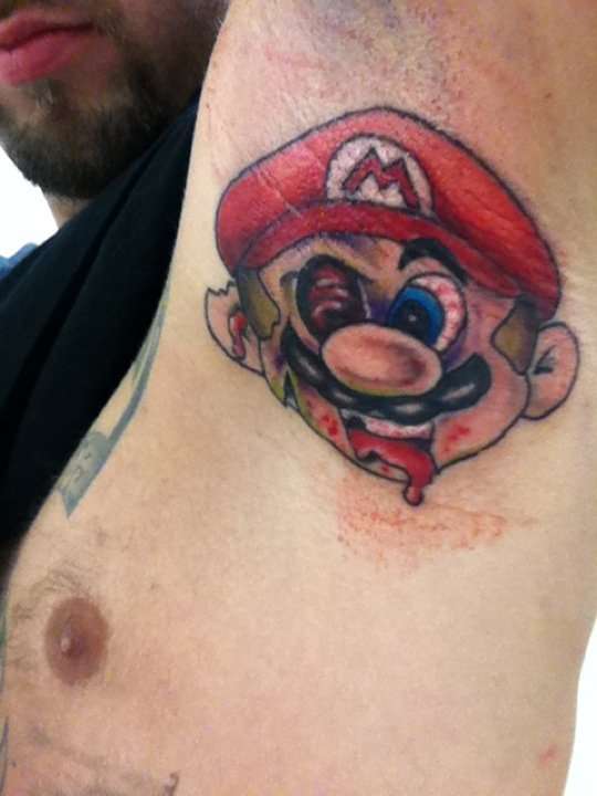 Zombie Mario Face Tattoo On Armpit