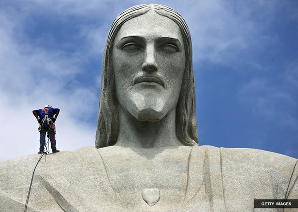 A Climber On The Christ The Redeemer Statue