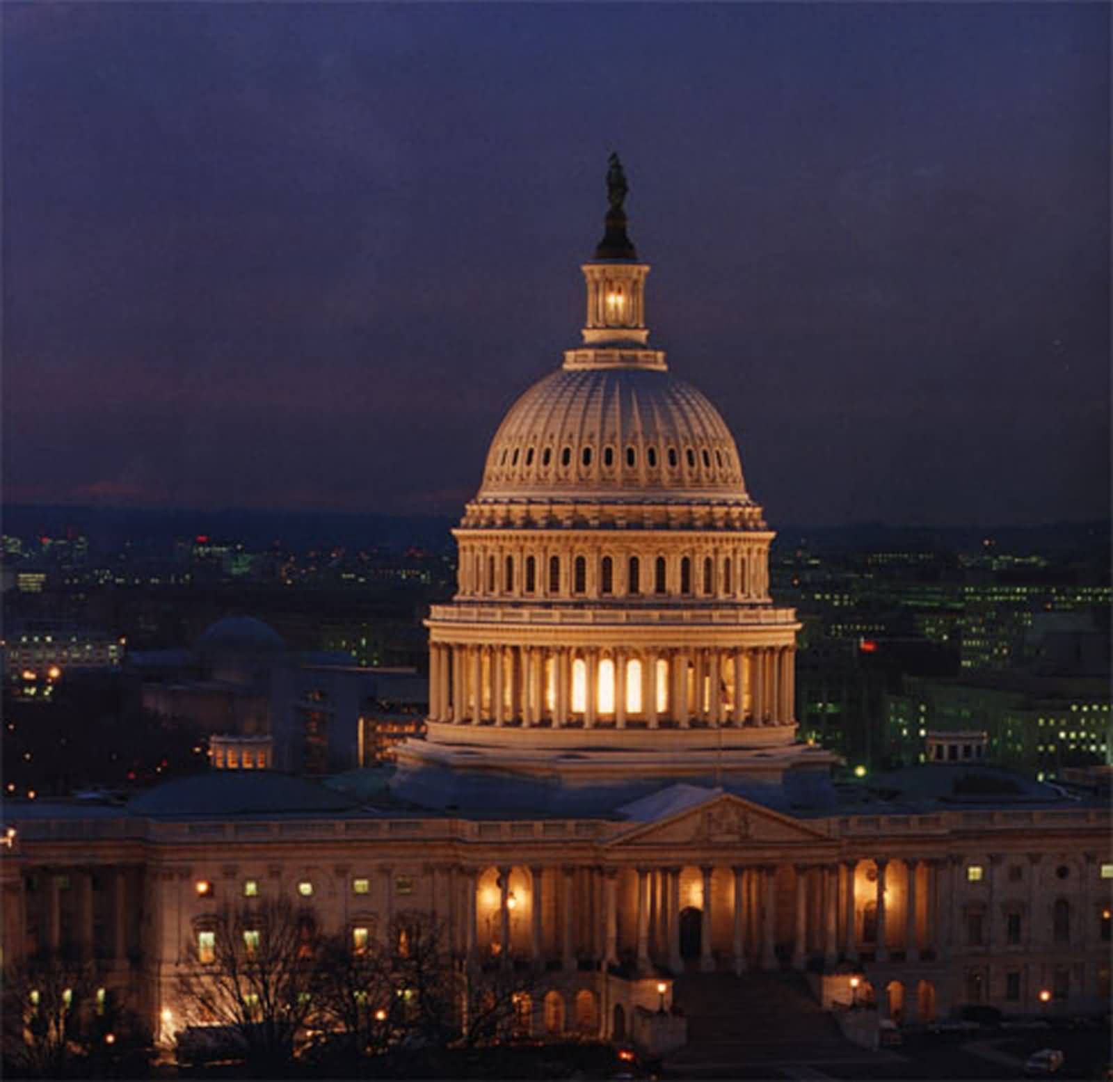 Aerial View Of United States Capitol At Night