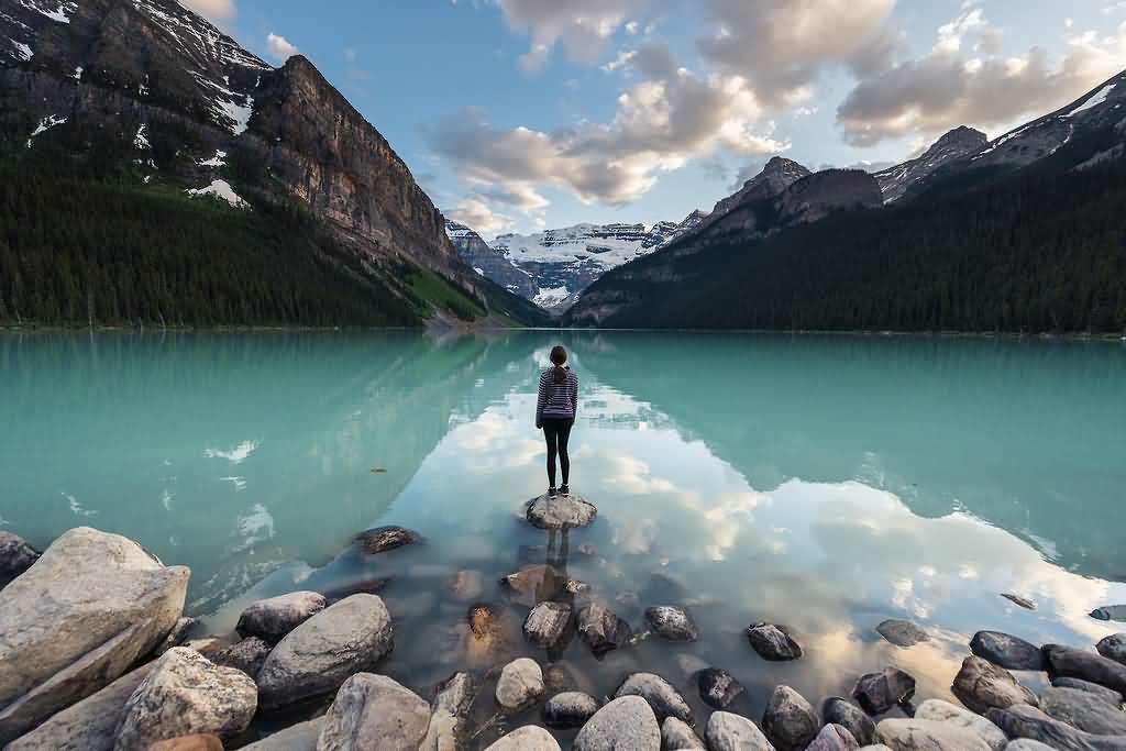 Alone Girl Standing Near The Lake Louise