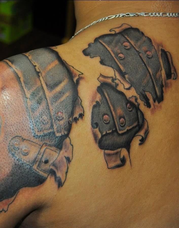 Armor Torn Skin Tattoo On Upper Shoulder