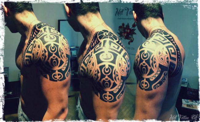 Attractive Black Maori Tattoo On Upper Shoulder For Men