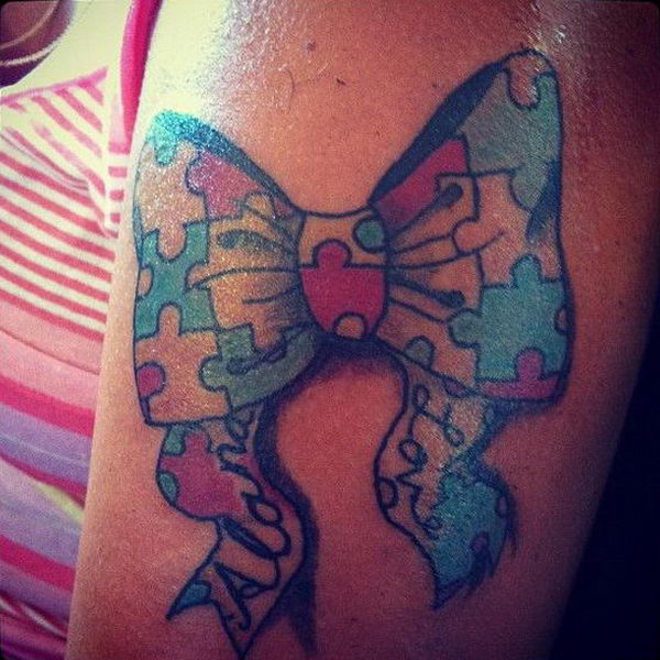 Autism Puzzle Bow Tattoo On Shoulder
