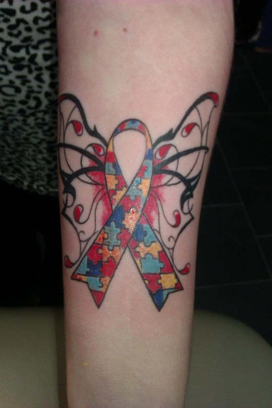 Autism Puzzle Cancer Memorial Tattoo On Forearm