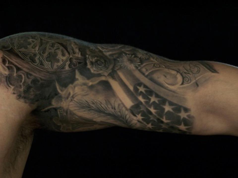 Awesome American Armor Tattoo On Half Sleeve