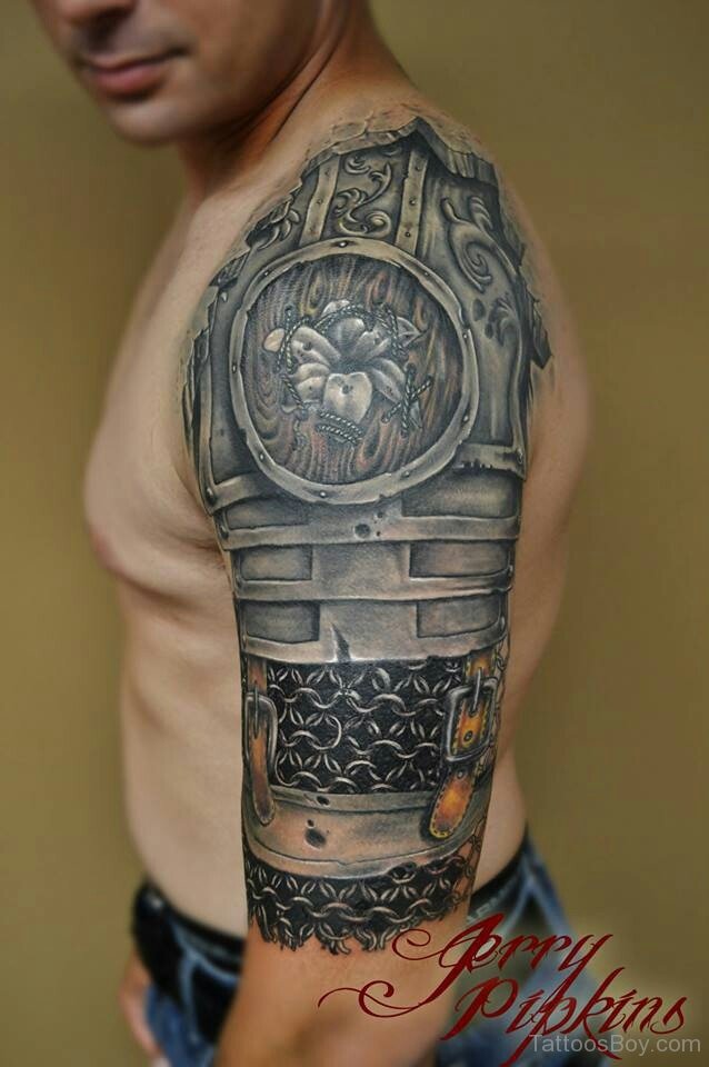 Awesome Black Armor Tattoo On Half Sleeve