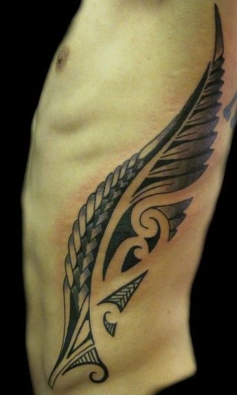 Big Tribal Feather Tattoo On Rib Cage