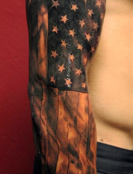 Black And White American Flag Tattoo On Sleeve