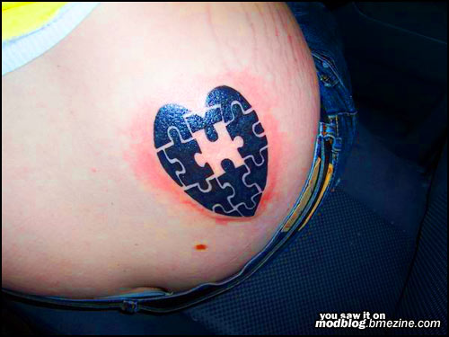 Black Puzzle Heart Tattoo