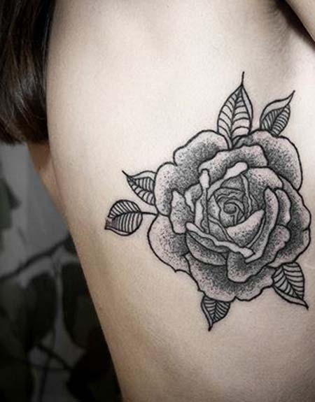 Black Traditional Rose Rib Cage Tattoo