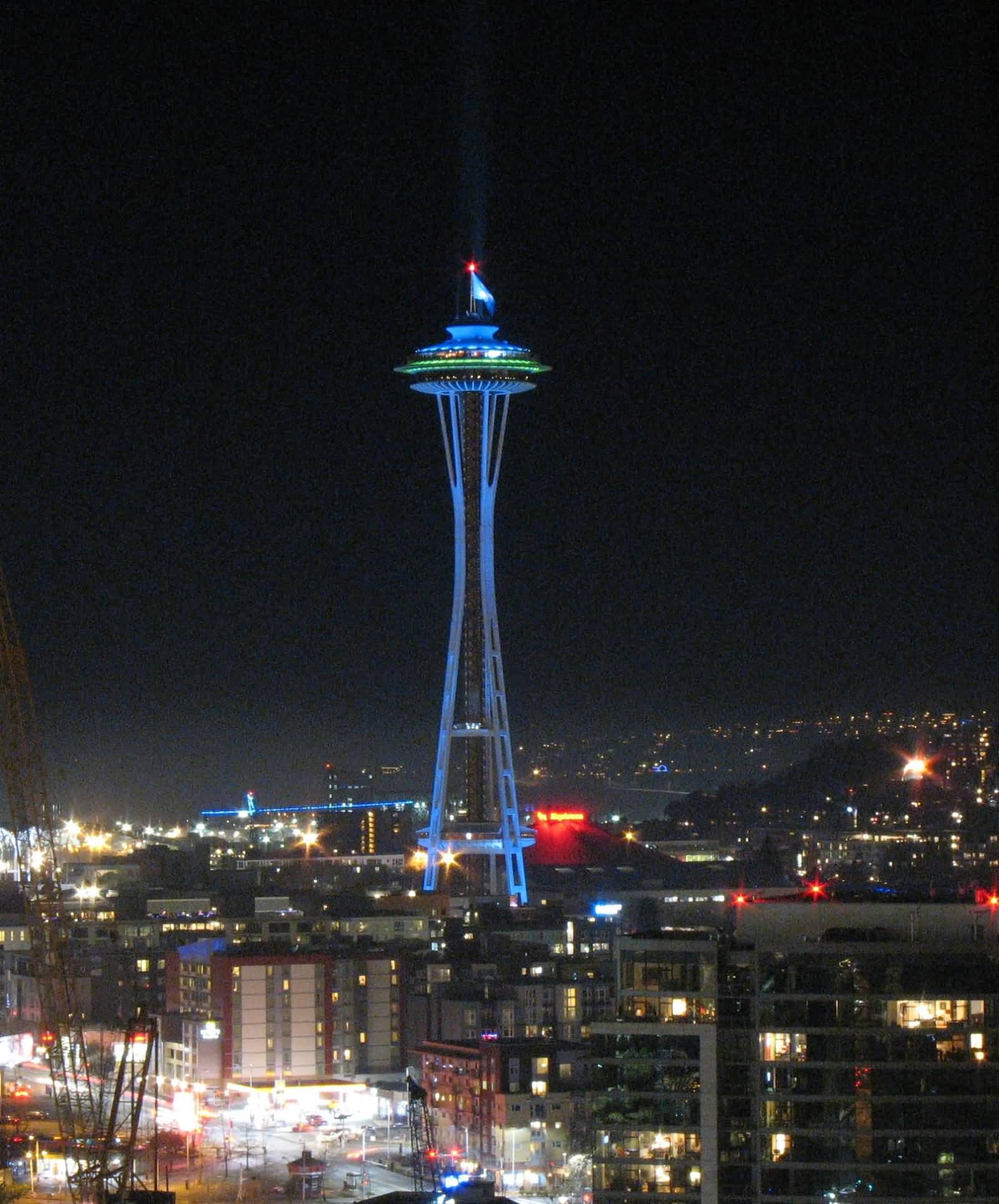 Blue And Green Lights On Space Needle At Night