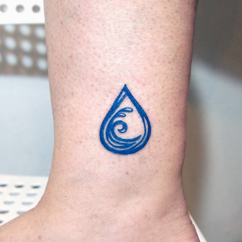 Blue Color Water Drop Tattoo On Wrist