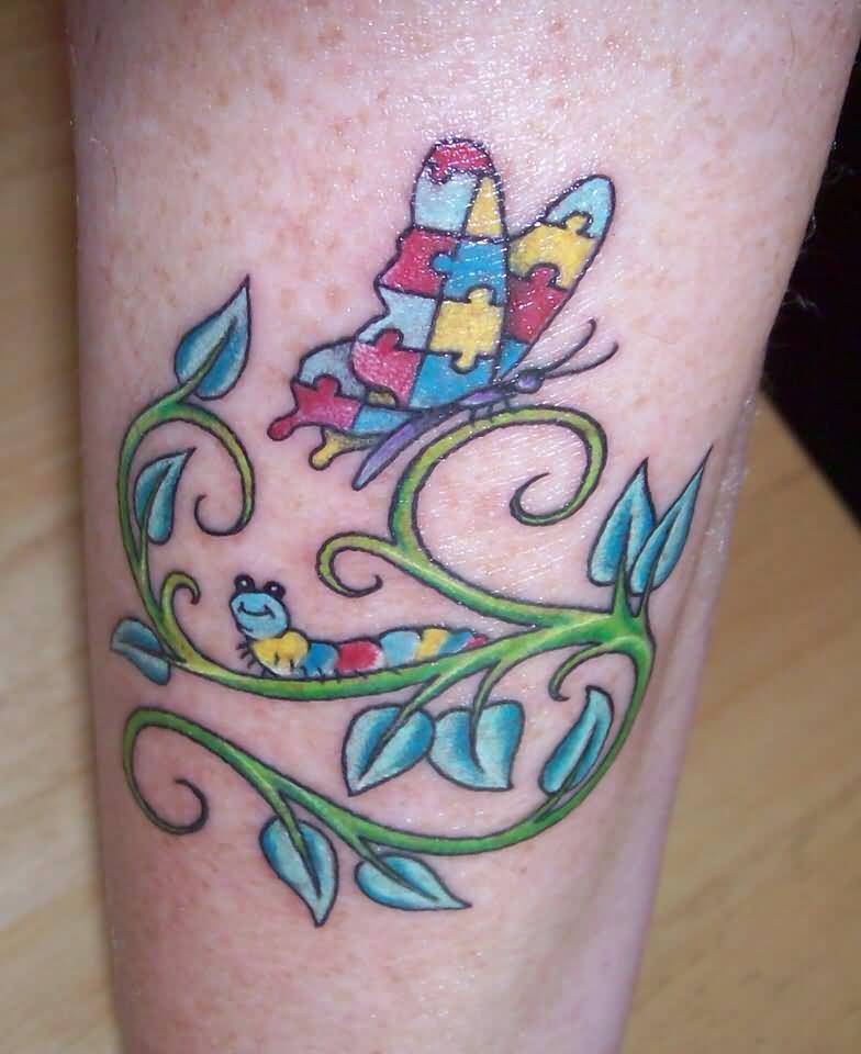 Butterfly And Caterpillar Autism Puzzle Tattoo On Arm