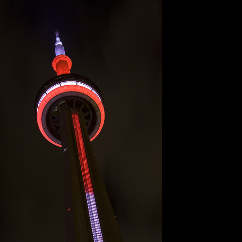 CN Tower Looks Beautiful With Red And White Lights During Night