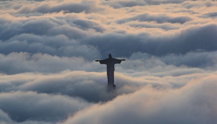 Christ The Redeemer Statue Covered With Clouds Fog