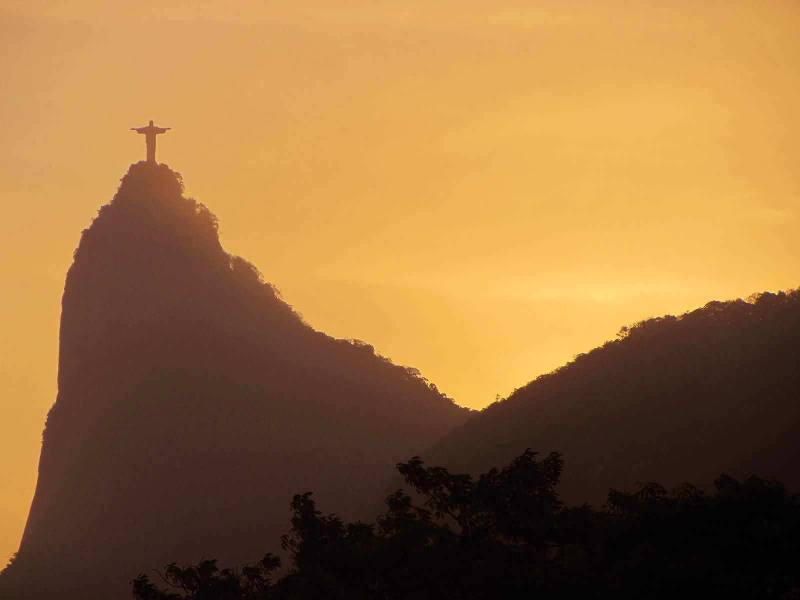 Christ the Redeemer Atop Crocovado Mountain Sunset View