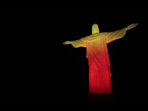 Christ the Redeemer Statue Looks Beautiful With Yellow And Red Lights At Night