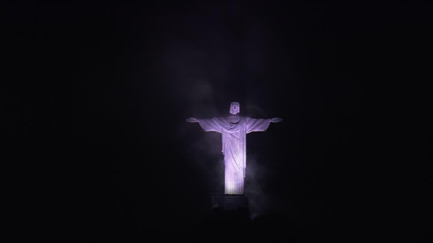 Christ the Redeemer Statue With Purple Lights At Night