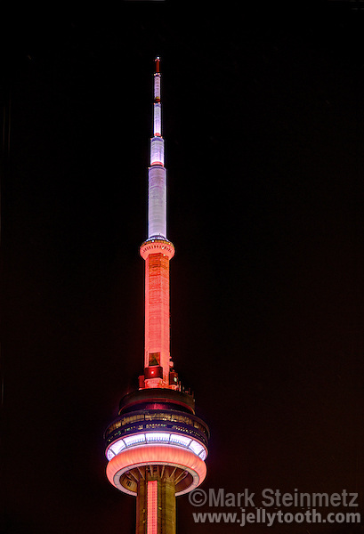 Close Up Of The CN Tower Illuminated At Night