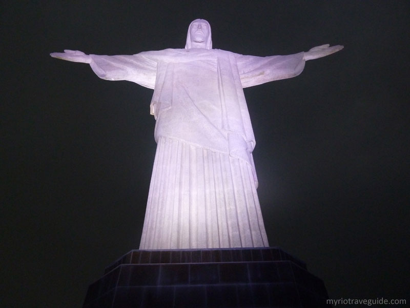 Closeup Of Christ the Redeemer Statue Lit Up At Night In Rio