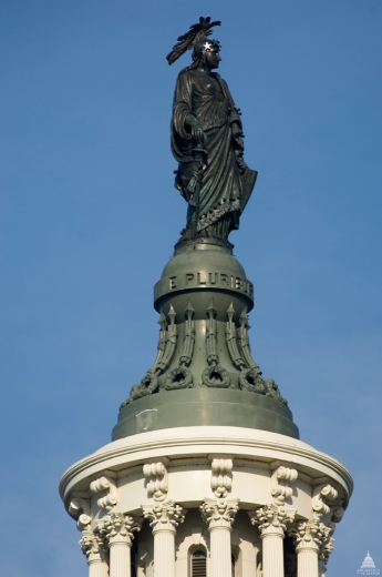 Closeup Of The Statue Of Freedom On The Top Of United States Capitol Building