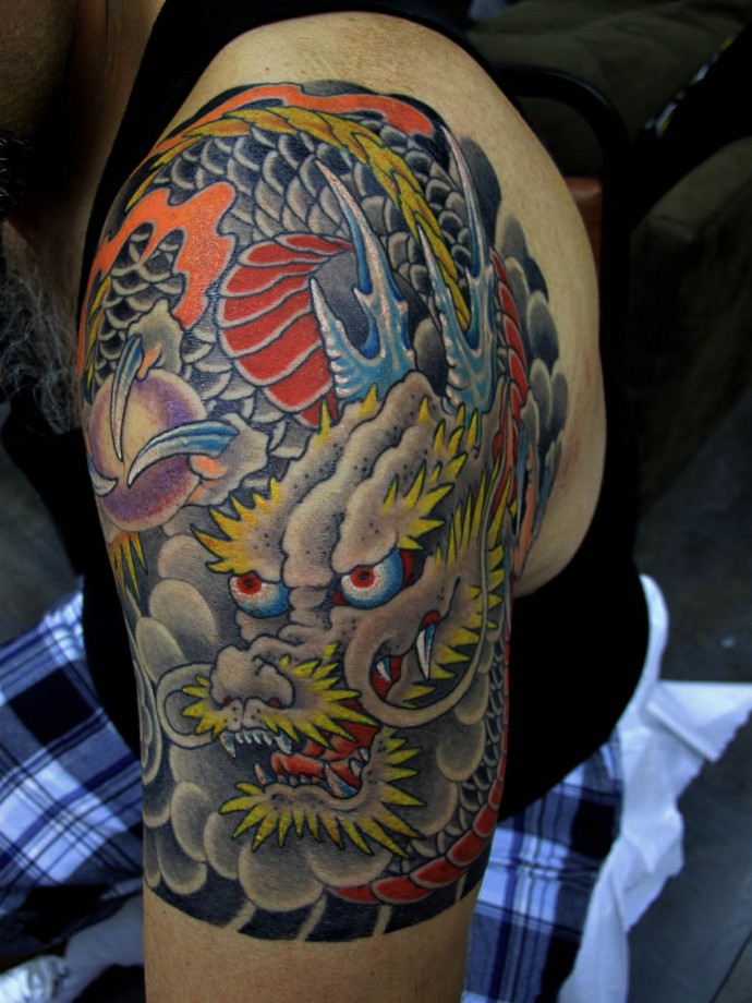 Color Dragon Tattoo On Left Shoulder by Chris Nunez