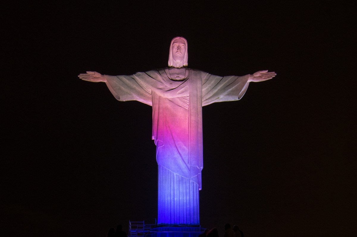 Colorful Lights On The Christ the Redeemer At Night