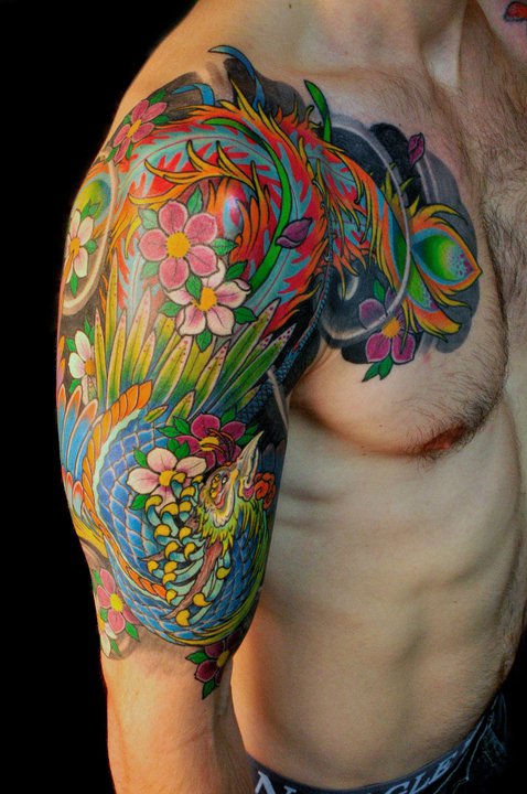 Colorful Phoenix Tattoo On Right Half Sleeve by Ami James