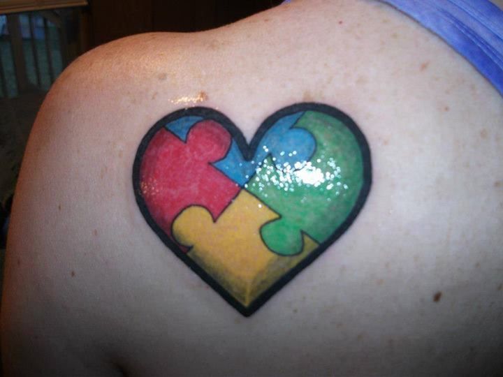 Colorful Puzzle Heart Tattoo On Back Shoulder