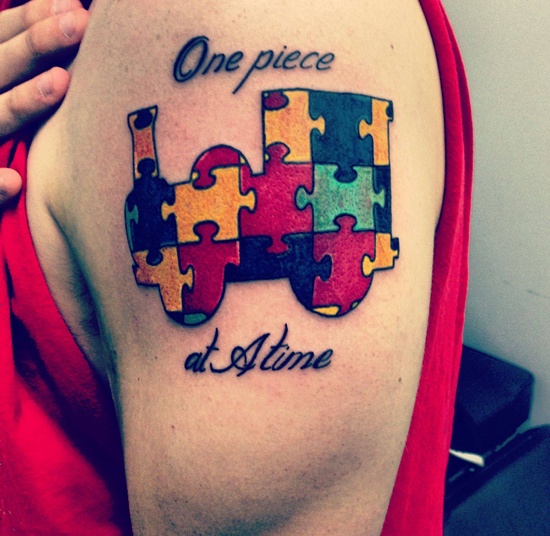 Colorful Toy Train Puzzle Tattoo On Shoulder