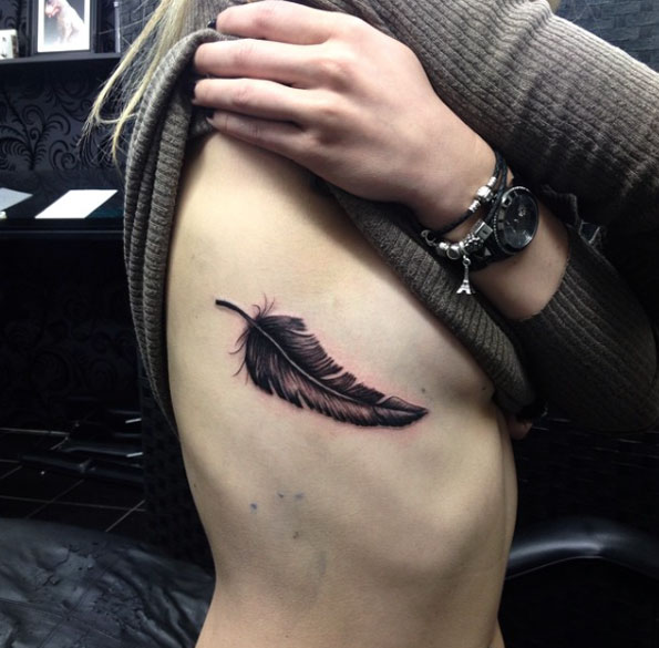 Cool Blackwork Feather Tattoo On Rib Cage By Kev Richardson Jr