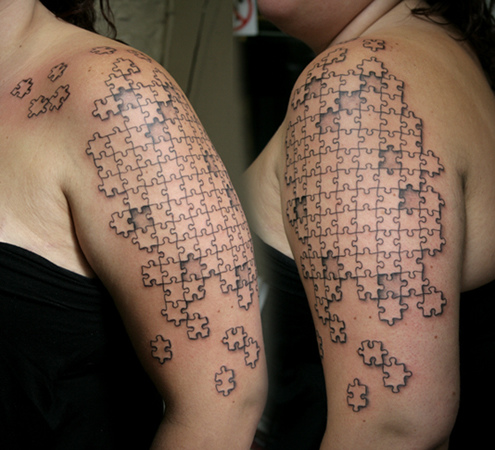 Cool Jigsaw Puzzle Tattoo On Half Sleeve For Woman