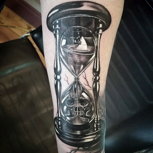 Cool Skull In Hourglass 3D Tattoo On Arm