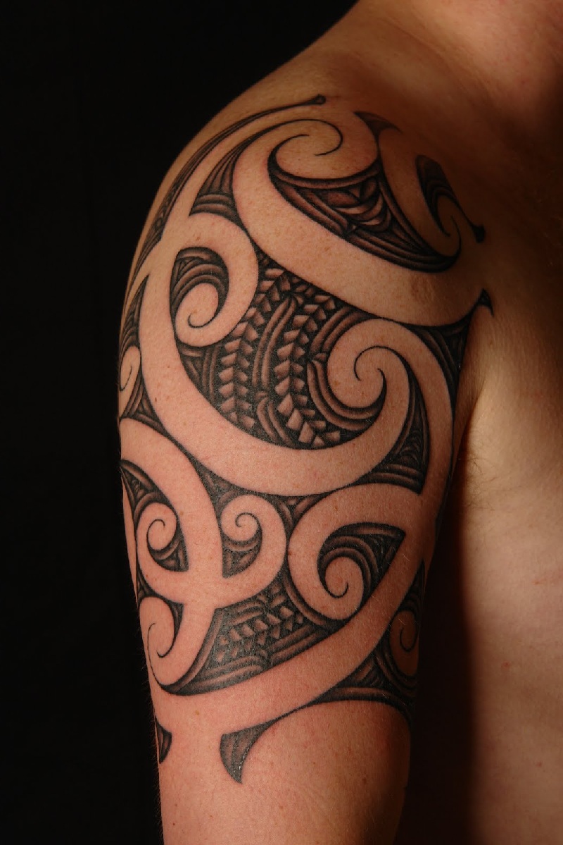 Cool Tribal Maori Tattoo On Upper Arm For Men