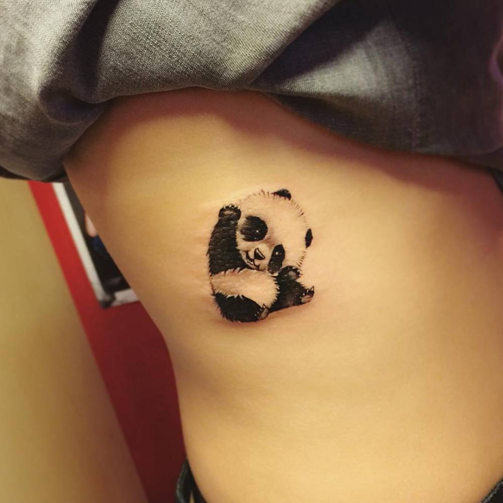 Cute Baby Panda Tattoo On Rib Cage By Jay Shin