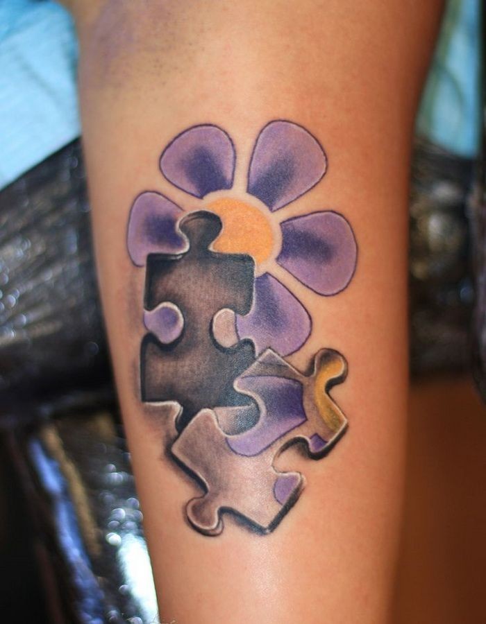 Daisy Puzzle Tattoo On Forearm