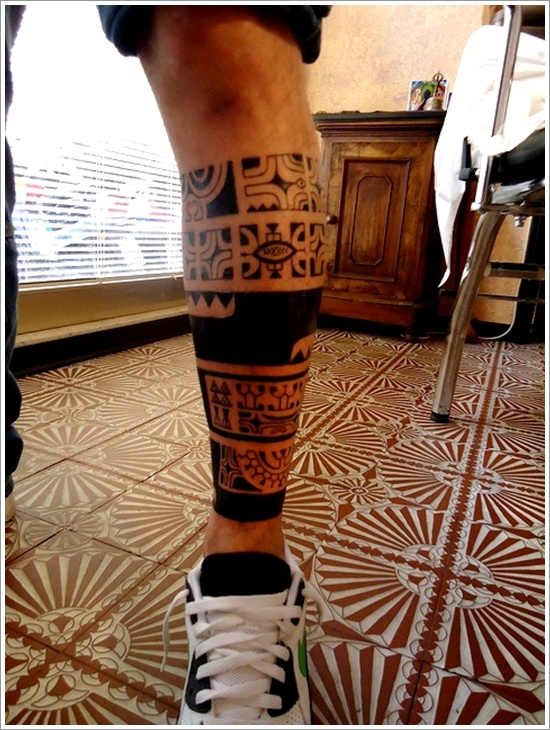 Dark Black Maori Leg Tattoo