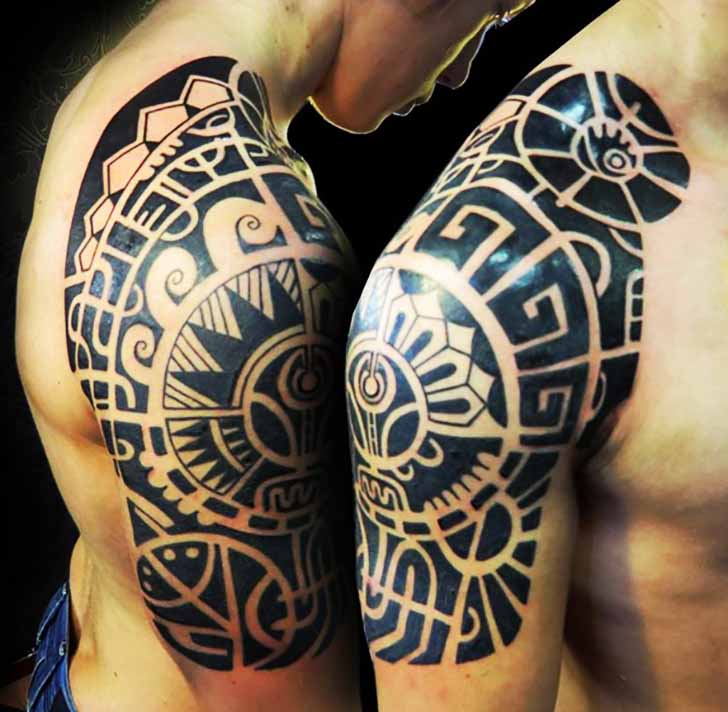 Dark Black Maori Tattoo On Shoulder