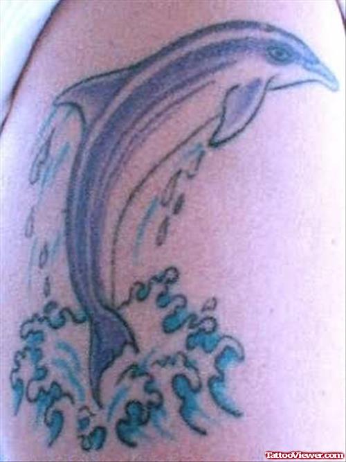 Dolphin Jumping In Water Tattoo