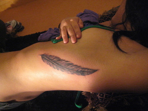 Feather Tattoo On Left Side Rib